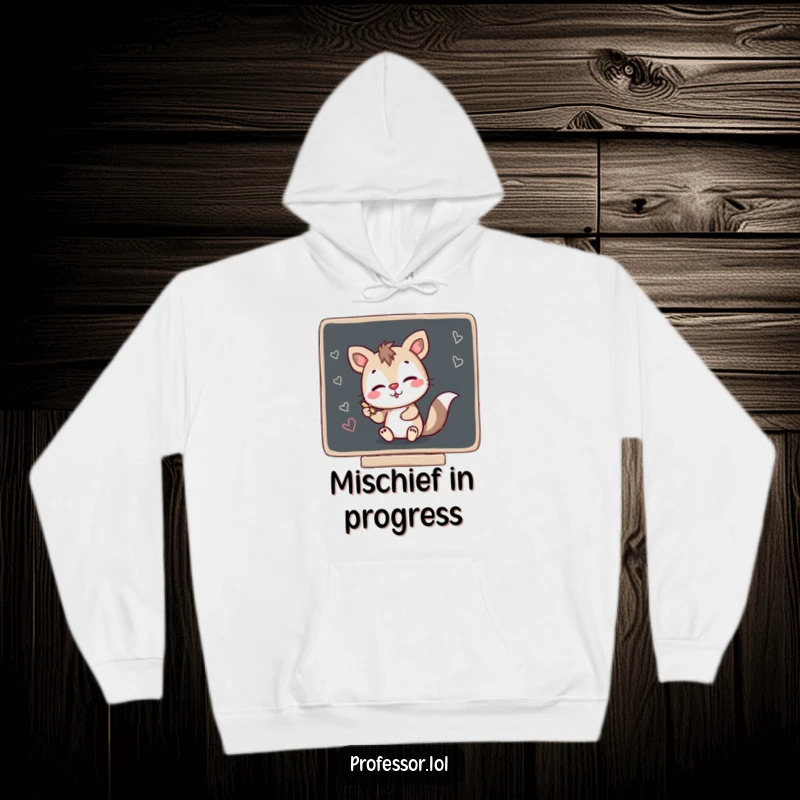 Funny hoodie depicting a mischievous animal character creating chalk scribbles on a blackboard, offering cozy comfort and humor.